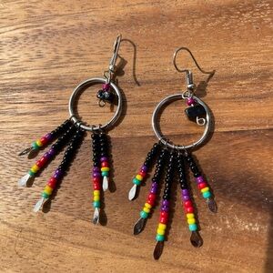 Black beads with purple, red , yellow and green